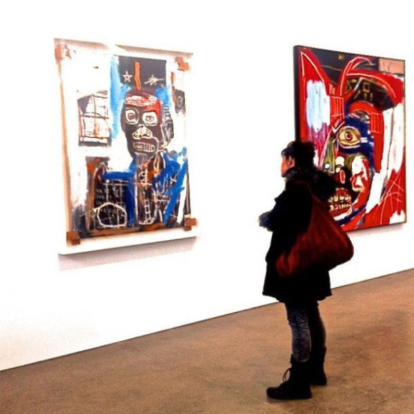 woman looking basquiat art gagosian