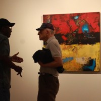two men discussion art minneapolis