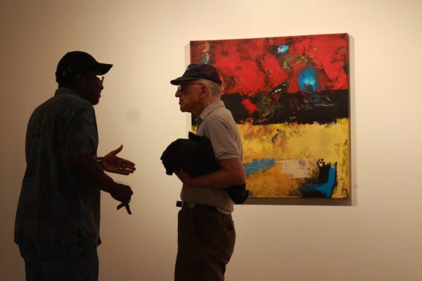 two men discussion art minneapolis